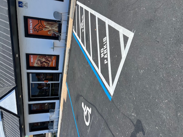 Clean Lines and Curb Appeal: Commercial Parking Lot Striping in Gulf Breeze, FL by Parking Lot Maintenance of the Panhandle