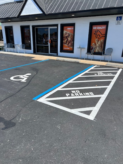 Clean Lines and Curb Appeal: Commercial Parking Lot Striping in Gulf Breeze, FL by Parking Lot Maintenance of the Panhandle